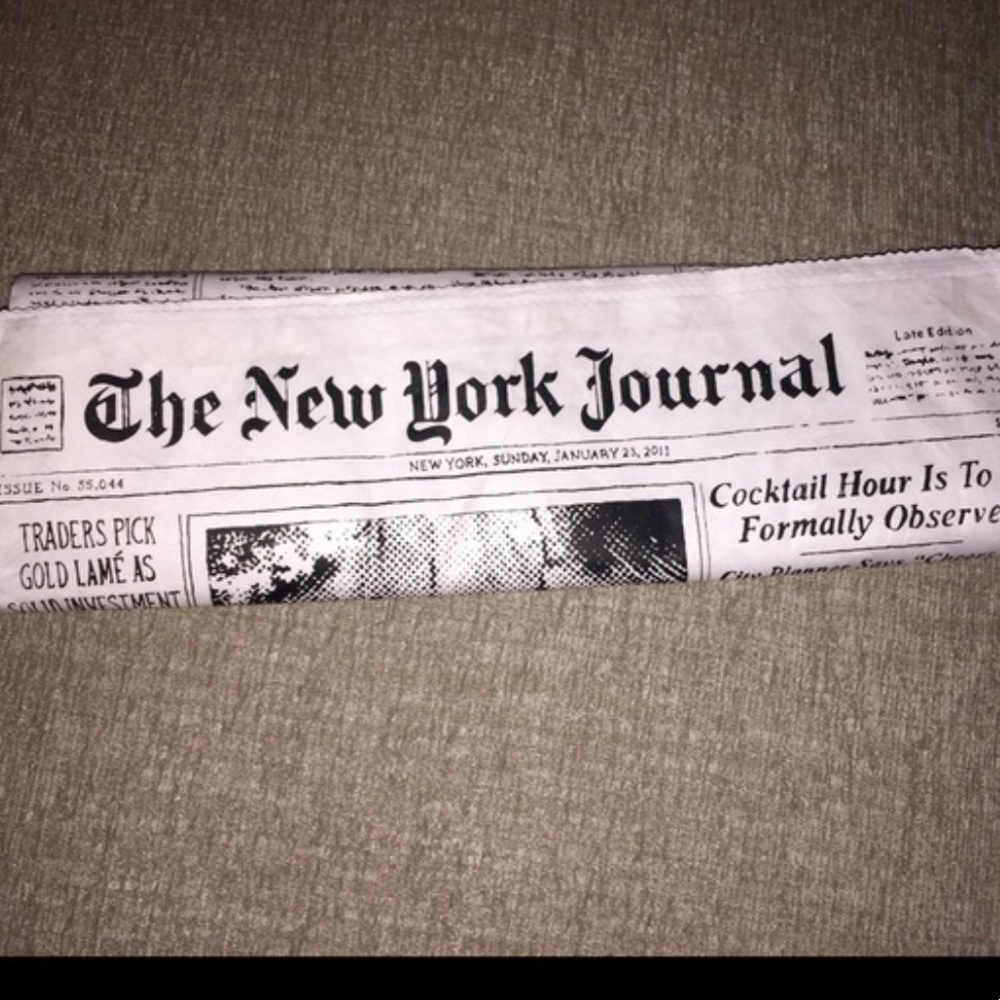Kate Spade newspaper clutch